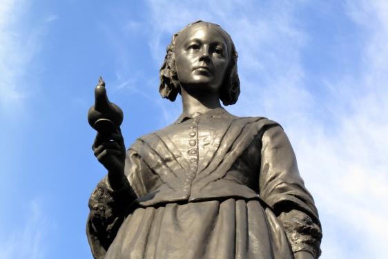 photo of statue with sky background