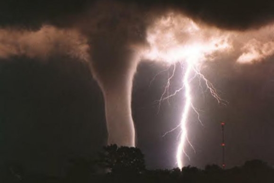 photo of lightning and a tornado funnel